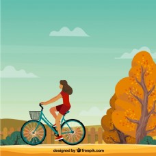 有自行车和秋天风景的女人