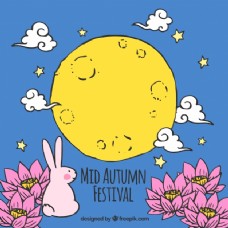 秋日蓝色的背景一只兔子和一个黄色的月亮中秋节