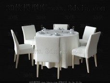 简单的白色的桌子和椅子